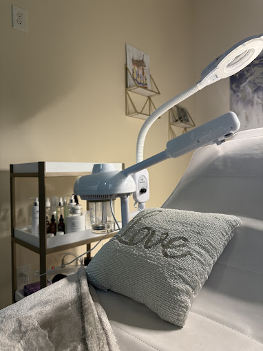 A hospital bed with a light on top of it